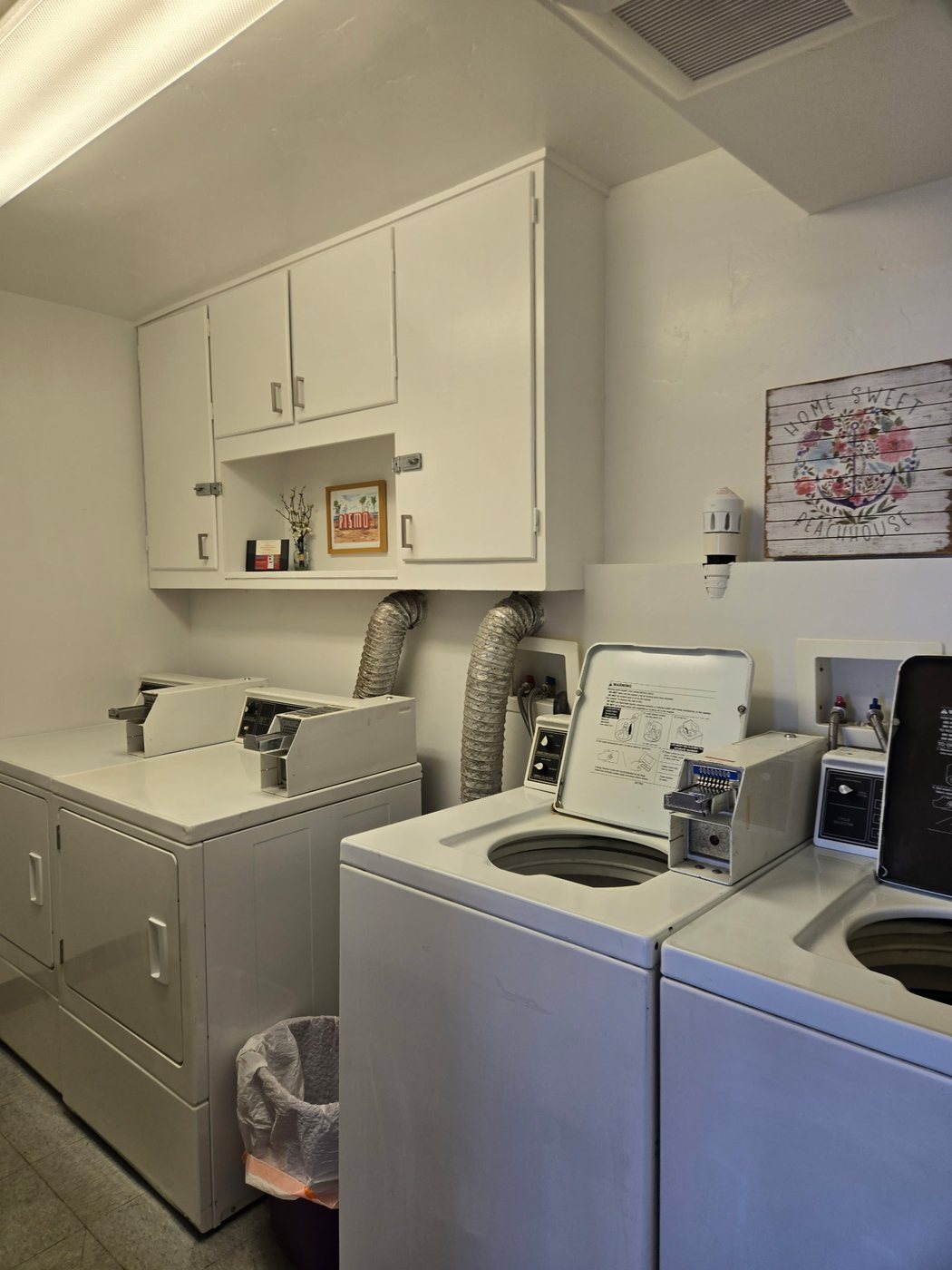 The shared laundry room under Building One